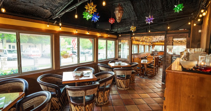 Interior, bar area seating with tables and armchairs