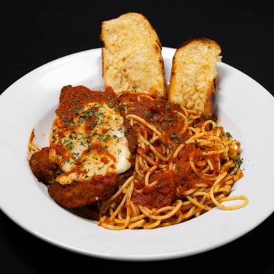 Chicken Parmigiana, served with homemade marinara & a side of fries..