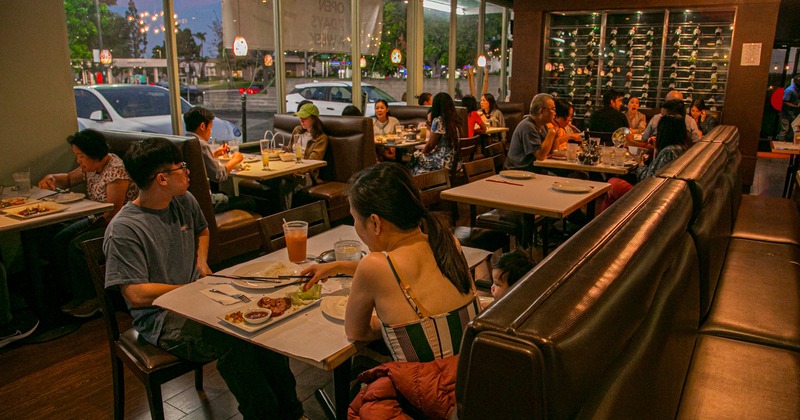 Interior, table and chairs, people