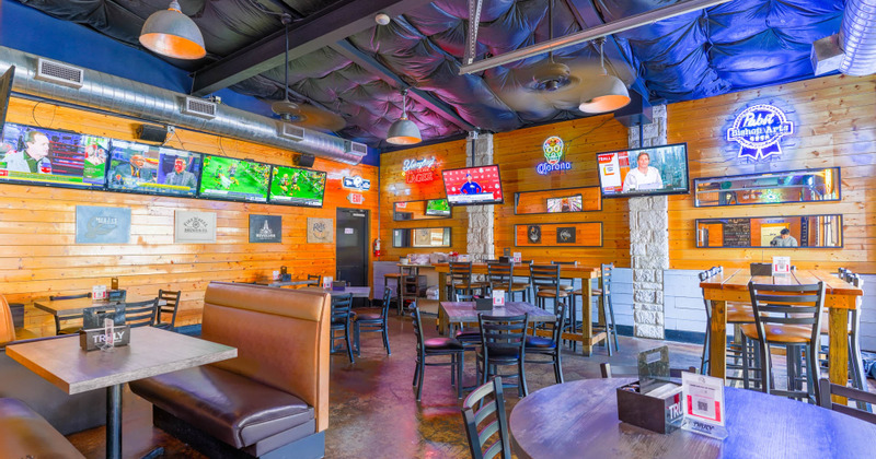 Interior, dining booths and tables, TVs