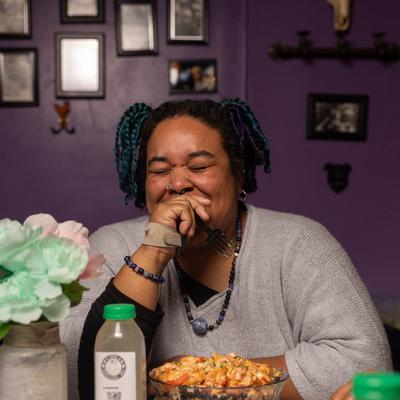 A customer dining at a table inside.