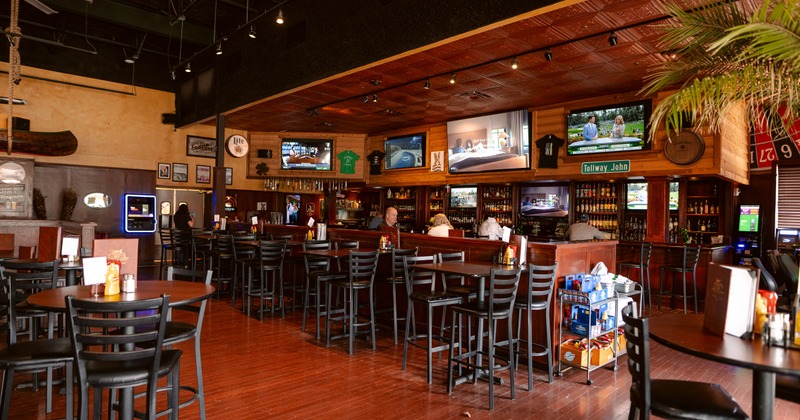 Sports bar interior seating area, and bar