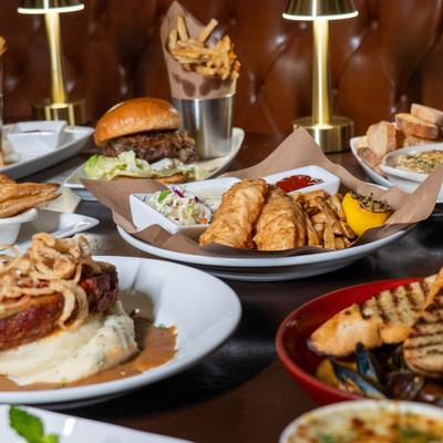 Assorted dishes arranged on a restaurant table.