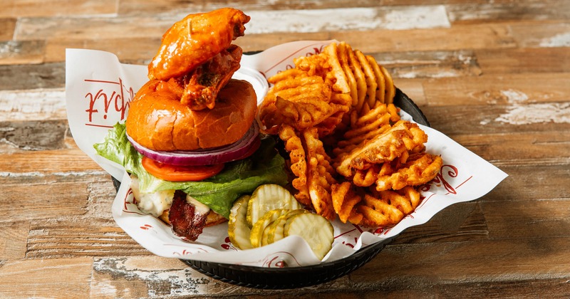 A served Bleu & Buffalo Wing Burger