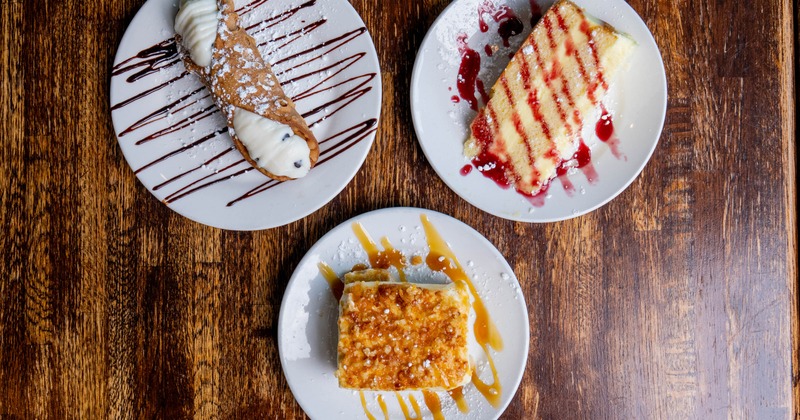 Various desserts served on the table, top view