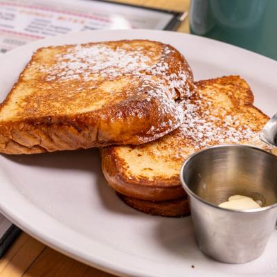 French Toast sprinkled with powdered sugar.