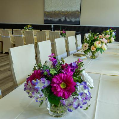 Floral arrangements on banquet tables.