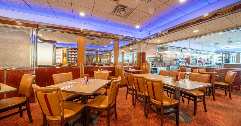 Interior, tables and chairs ready for guests