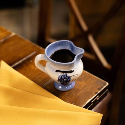 Sauce in a ceramic container.