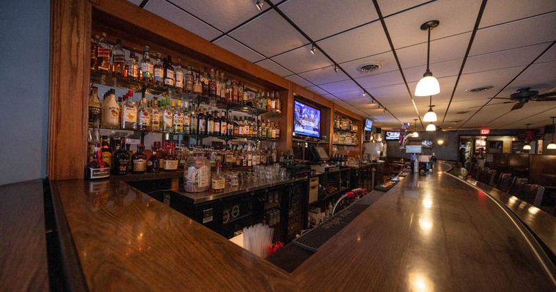 Interior, bar area, lots of bottles