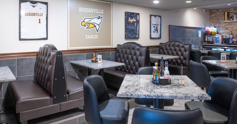 Diner area, booths, diner table in front, chairs