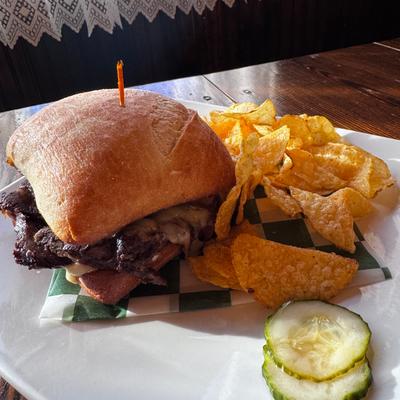Braised Rib Royal - Braised Short Rib, Roasted Garlic Aioli, Mushrooms and Onion, Smoked Gouda Cheese on Ciabatta Bread.