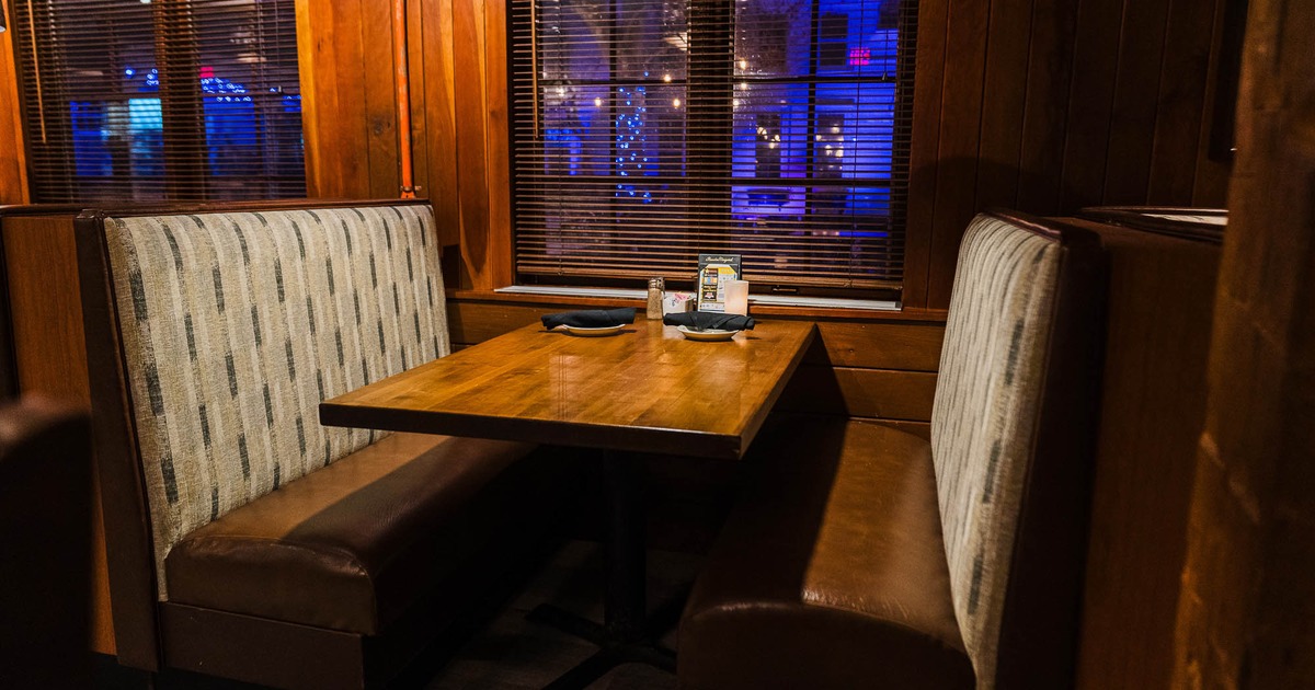 Interior, booth and table with tableware