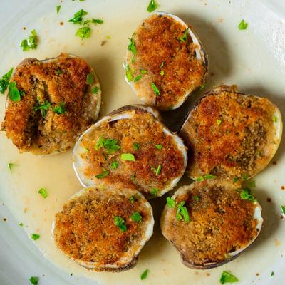 Clams, with seasoned breadcrumbs, and lemon white wine sauce.