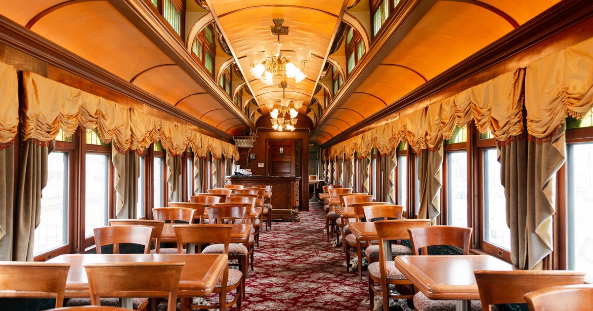 Train interior seating area with decoration