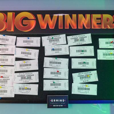 Big winner board with cash-out vouchers.