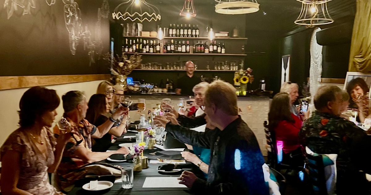 Servers attending to their tables