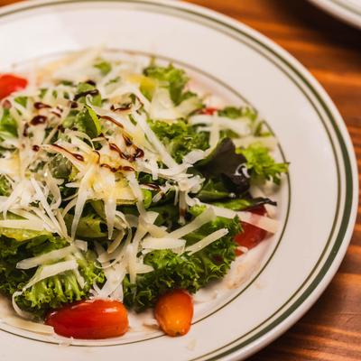 Mixed salad with parmesan cheese.