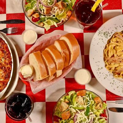 Assorted food dishes and drinks, top view.