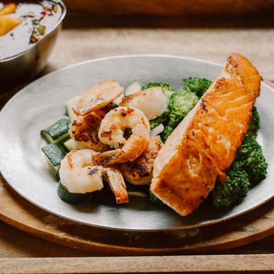 Happy boat with salmon filet.