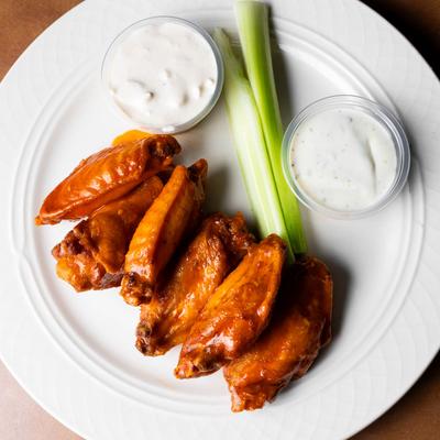 House made wings, served traditional or boneless style in your choice of sauce and a side of house made blue cheese or ranch.