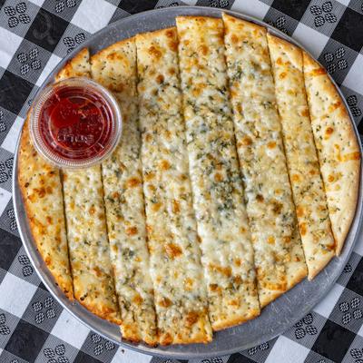 Cheesy Garlic Bread with marinara sauce.