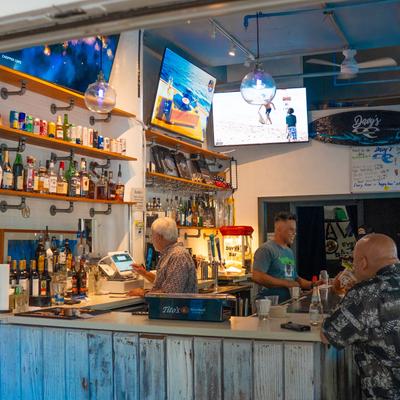 Bar, barmen, drink rack.