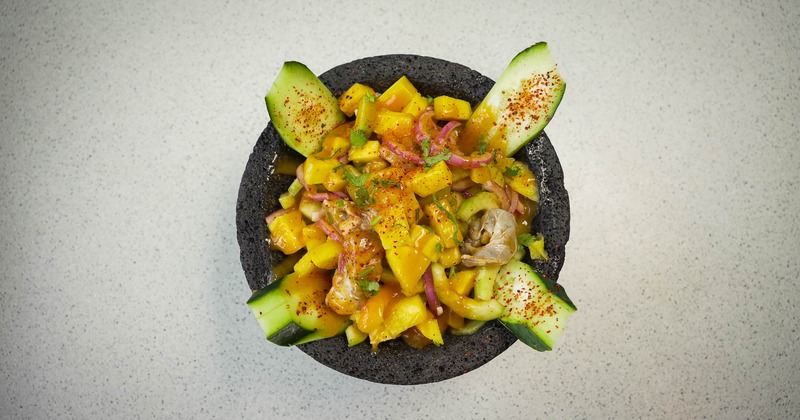 Shrimp marinated in lime juice, with mango