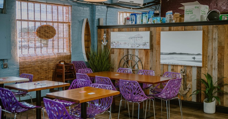 Interior, tables and chairs ready for guests