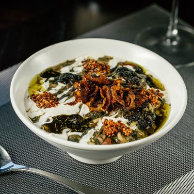Soup with vegetables, noodles, beans, and whey.