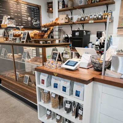 Cash register and various items on display.