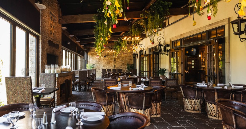 Interior, regular and high seating area, wooden top tables for two and four