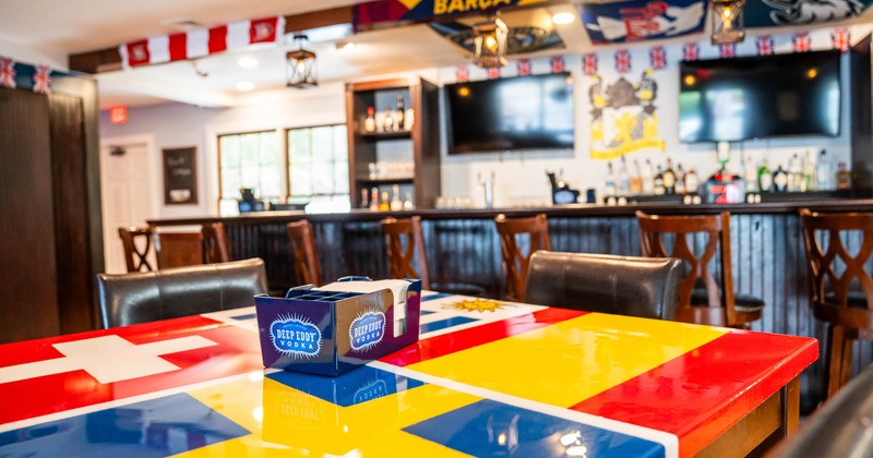 View at the bar from the table decorated with a flag design