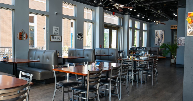 Interior, seating area with tables and chairs