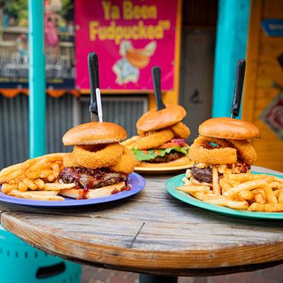 Burgers served with fries.