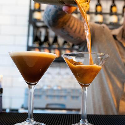 A staff member serving drinks.