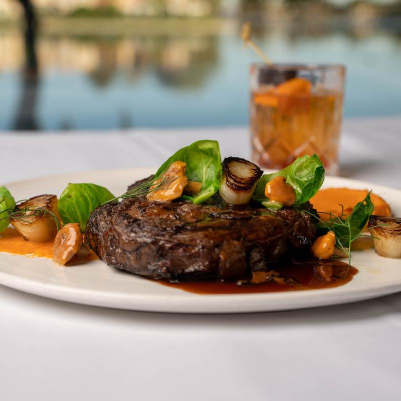 18 oz Bone in Ribeye* photo