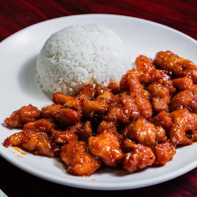 Orange chicken served with steamed white rice.