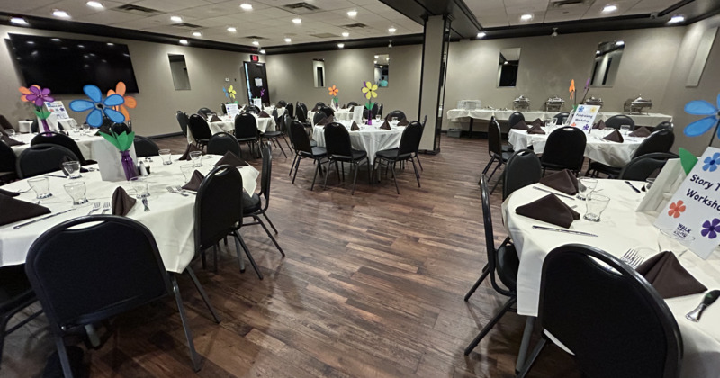 Vintage looking interior, lined up tables and chairs ready for guests