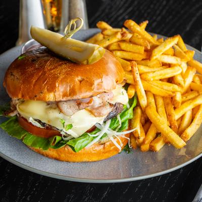 Burger with fires in the plate.