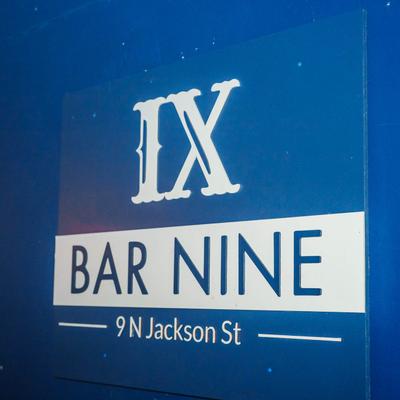 The bar's name on the wall.