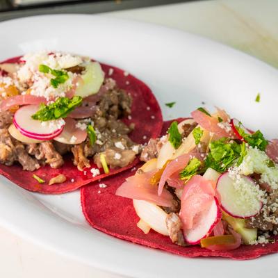 Two tacos al pastor.
