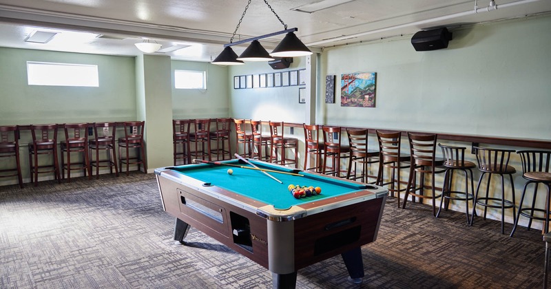 Interior, pool table area with chairs