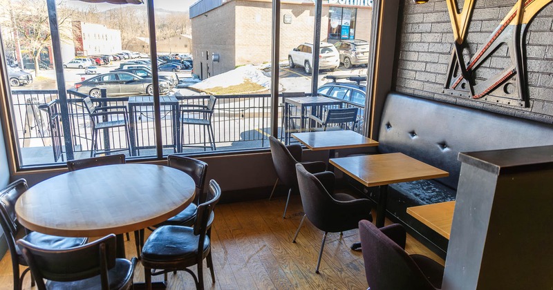 Interior, tables and chairs near window