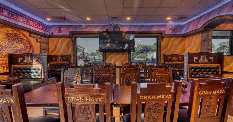 Interior, seating area with wooden tables and chairs
