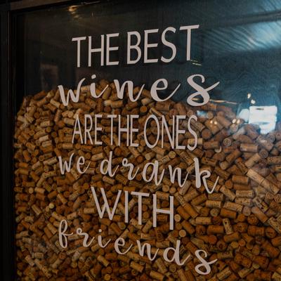 Glass case filled with wine corks.