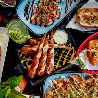 Assorted dishes and drinks from Industry East.