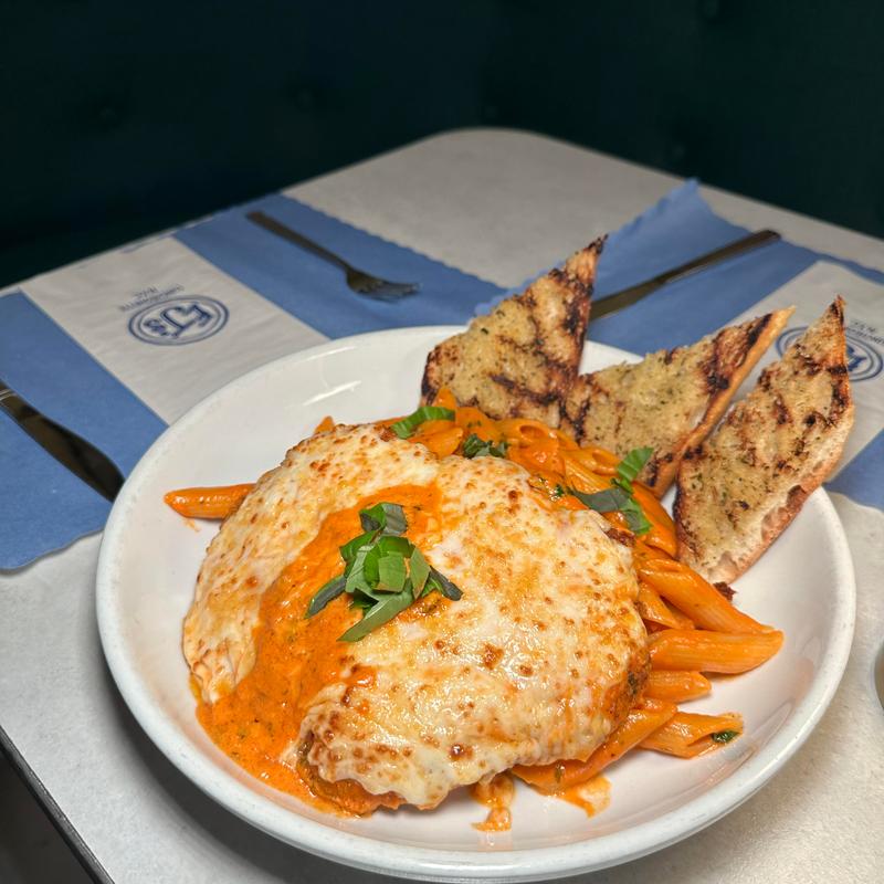 menu item 32 of 34, Chicken Parmigiana over Spaghetti*