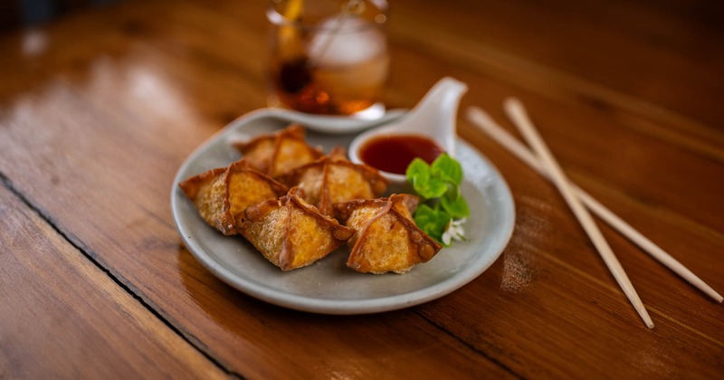 Crab Rangoon served with sauce