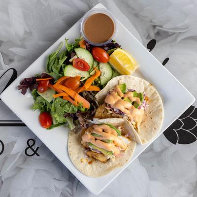 Grilled fish tacos, top view.